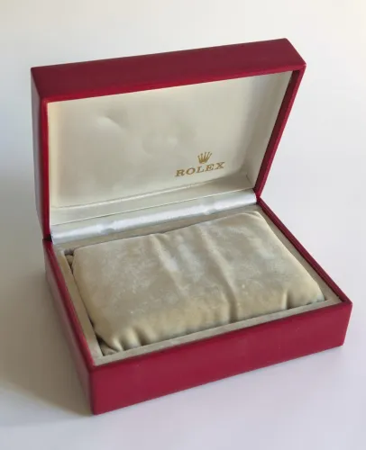 Rolex watch box Dark red with beige inner lining and outer box 14.00.02 Circa 1990s