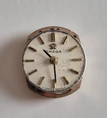 Omega 484 movement 17 Jewel manual wind with silver tone dial & hands