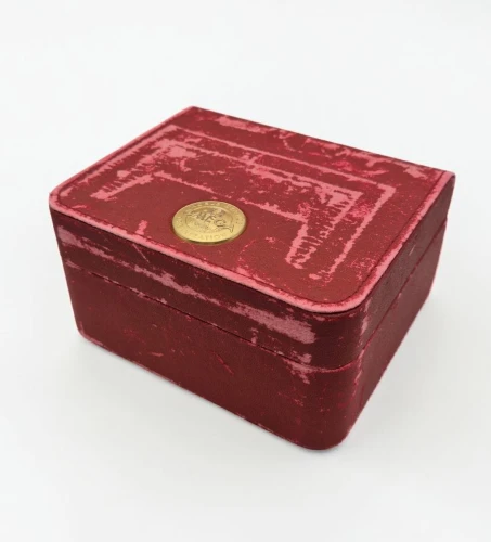 Omega red leather Watch box Circa 2000s gold colour medallion